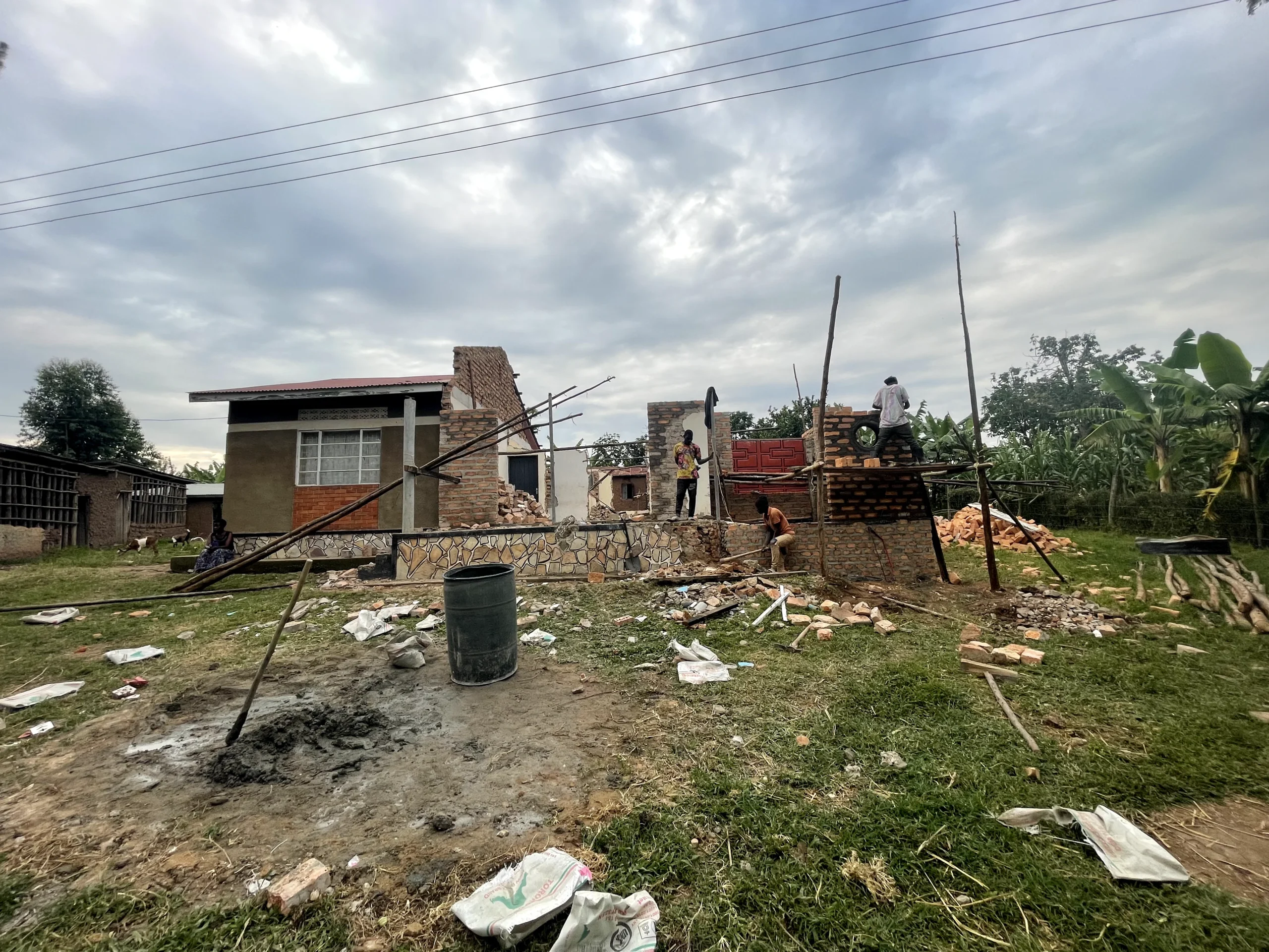 Supervisor checking tile alignment and finish quality